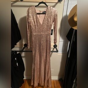 Floor length long sleeve fitted sequins formal dress. New with tags. Rose gold.